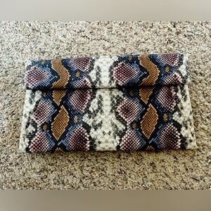 Faux snake skin purse with gold shoulder chain